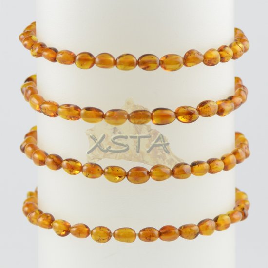 Small tiny amber beads bracelet cognac